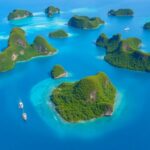 Aerial view of Raja Ampat islands and turquoise waters.